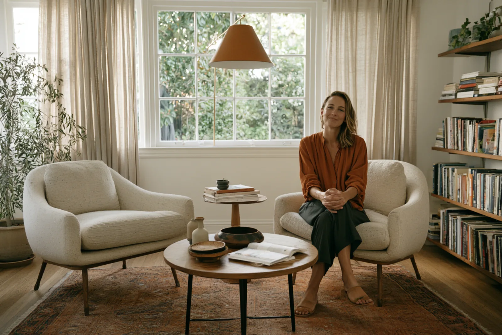 A calm, inviting San Rafael therapy office with two armchairs and warm natural light